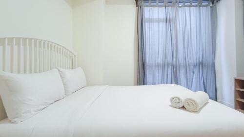 Makassar Wohnung | Comfortable and Tidy 2BR at Vida View Apartment By Travelio