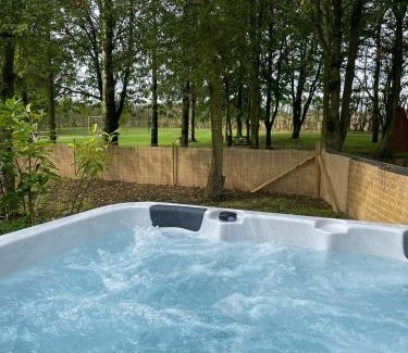 Toppesfield Haus | Copper Beech Lodge with Hot Tub, Games Room, Fire Pit