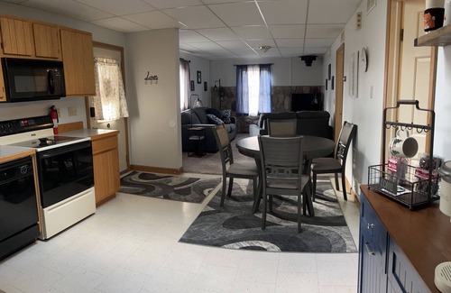 Grayling Haus | Copper Fox Cottage is cozy and welcoming, near trails and Manistee River.