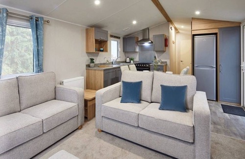 Dunbar Haus | Cosy 2 bedroom caravan with Patio doors onto decking, situated near Dunbar.