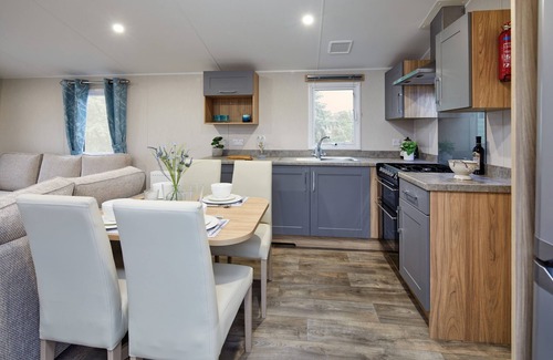 Dunbar Haus | Cosy 2 bedroom caravan with Patio doors onto decking, situated near Dunbar.