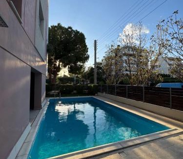 Glyfada Wohnung | Cosy apartment with shared pool and garden