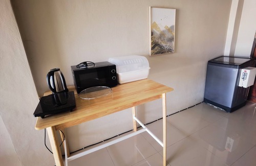 Nakhon Chai Si Haus | Cozy 2-bedroom building in tranquil Tambon Ngiu Rai with WiFi, AC