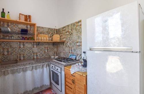 Caminia Wohnung | Cozy and charming apartment with garden and sea view.