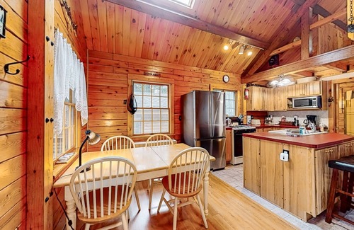 Beaver Cove Haus | Cozy cabin with covered porch, firepit, grill, fireplace, & washer/dryer
