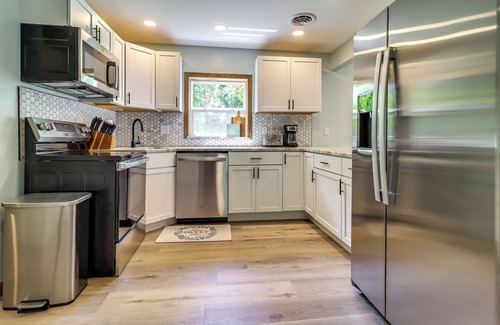 Horton Haus | Cozy Grass Lake Home w/ Patio, Fire Pit & Kayaks!