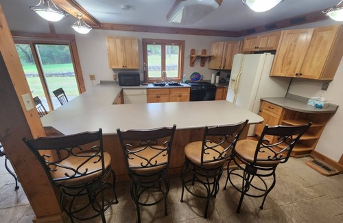 Troy Kabine | Cozy lodge with indoor pool, hot tub, loft and more! Great for a close getaway!