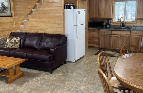 Thompson Falls Haus | Cozy, river front cabin in the woods just steps away from the Clark Fork.