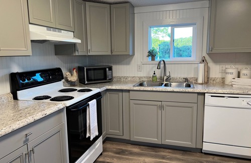Plummers Landing Haus | Cozy Sunset Cottage on the family farm near Cave Run Lake and Morehead State