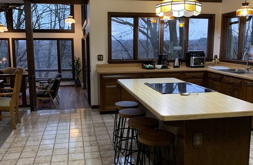 Conneaut Haus | Creek side retreat and breathtaking views! Moments from hunting and fishing!