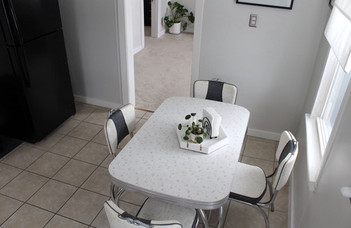 Cleveland Haus | Crisp 2 bedroom upstairs apartment in historic duplex