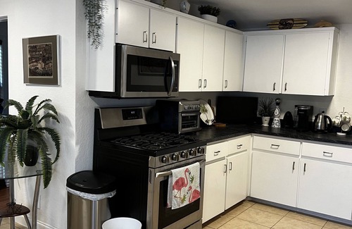 Edgewater Haus | Cute, comfortable home with a sunny front porch. 3 minute walk to the river.