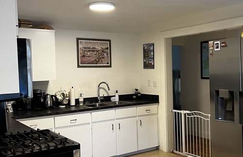 Edgewater Haus | Cute, comfortable home with a sunny front porch. 3 minute walk to the river.