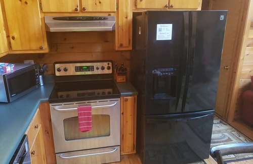 Arley Kabine | Cute, cozy log cabin on beautiful Smith Lake, Arley AL (year round deep water)