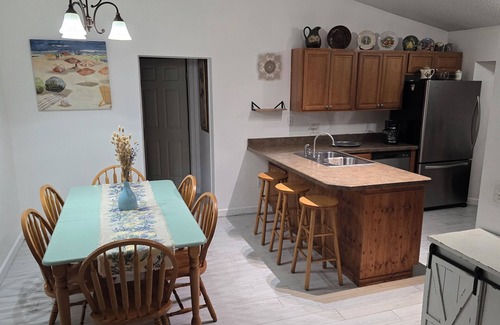 Port Orange Haus | Delightful 4-bedroom house with AC in Port Orange