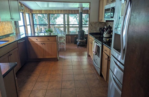 Picayune Haus | Delightful 4-BR with pond, deck, spacious yards in Picayune