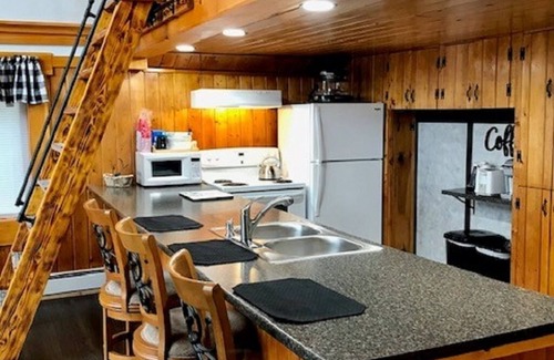 Sinclair Haus | Direct Trail Access-L & R Lakeside Rentals with this Beautiful Camp on Long Lake