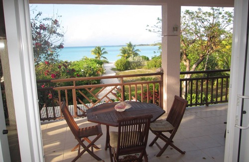 Great Exuma Wohnung | PERFEKT FÜR FAMILIEN, DIREKT AM HOOPERS BAY BEACH BEI CORAL SANDS VILLA.