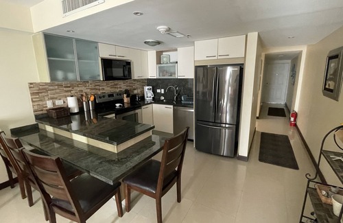 Oranjestad-West Eigentumswohnung | Penthouse Condo mit privater Dachterrasse in Ozeanien am Eagle Beach