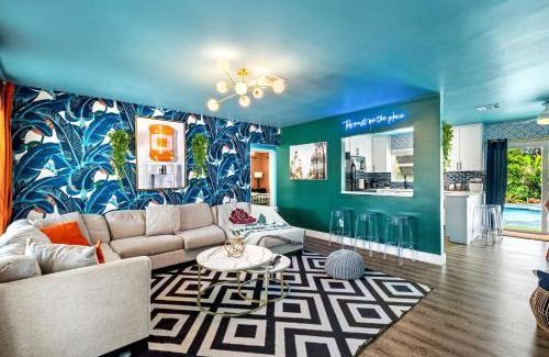 Garden Isles Haus | Eccentric home with pool tiki hut & outdoor kitchen