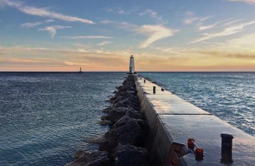 Beulah Haus | Elegant Stone Cottage Steps to Crystal Lake Beach