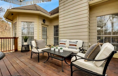 East Point Haus | Exquisite home with charming deck, washer/dryer, & central AC