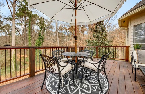 East Point Haus | Exquisite home with charming deck, washer/dryer, & central AC