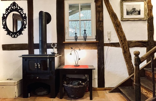 Munstermaifeld Haus | Fachwerk-Ferienhäuschen mit Veranda in direkter Moselnähe