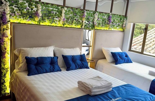 Usaquen Hotel | Family room boutique hotel Unicentro