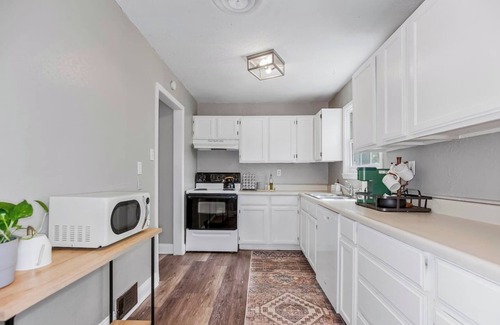 Prairie Village Haus | Feel at home in this charming house on a quiet street