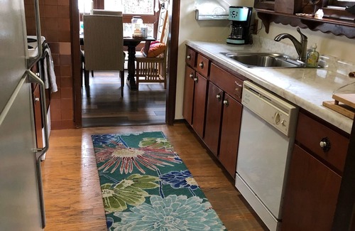 Howell Haus | Fenced in yard! Lovely Mid Century Feel with all Bedrooms facing the Water!