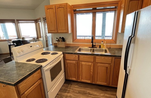 Bigfork Haus | Fill your soul w/ 400' of PRIVATE waterfront w/ dock, lift, diving board & more!