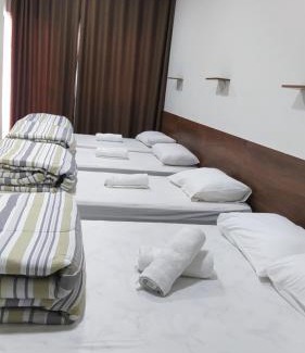 Aparecida Haus | Flat familiar com ar,wi fi,cozinha e garagem