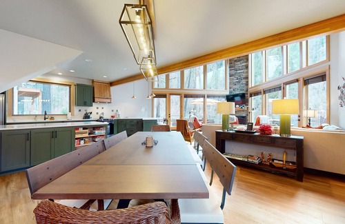 Vida Haus | Fully rebuilt riverfront home with deck, fireplace, & W/D - dog-friendly