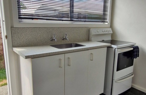 Napier Haus | Fully self contained unit with separate bedroom on beachfront property,