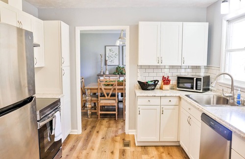 Anniston Haus | GAMEROOM Getaway! 4BR completely updated home with 2 King Beds and a sunroom!