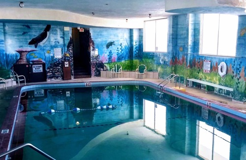 Bostwick Park Eigentumswohnung | Get lost in your DREAM VACATION in this modern beach condo