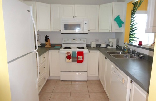 Bodden Town Eigentumswohnung | Grand Cayman - Luxus-Apartment mit 2 Schlafzimmern und 2 Badezimmern, wundervolle Terrasse mit Meerblick