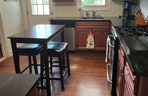 Highlands Hütte | Ground floor water side 1-bedroom cottage. Rocking chair front porch. No stairs