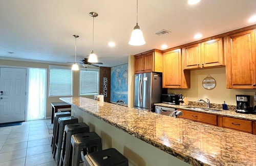 Cocoa Isles Haus | Heated Pool and Spa-3B/2B Waterfront on Canal close to the Beach