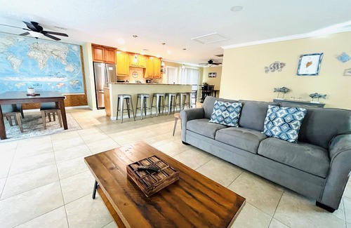 Cocoa Isles Haus | Heated Pool and Spa-3B/2B Waterfront on Canal close to the Beach