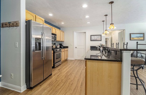 Traverse City Eigentumswohnung | High-End Downtown Traverse City Ground Floor Condo on Quiet Street