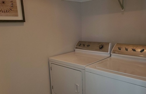 Riverfront Haus | Hip Strip Suites: Trendy Three Bedroom Townhome