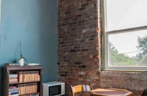 El Paso Haus | Historic Suite Overlooking Downtown. Located above a Museum! Claw foot tub. n