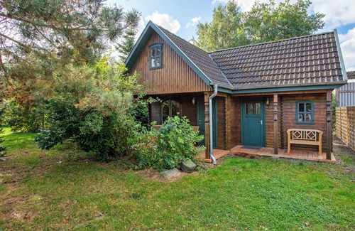 Verchen Haus | Ferienhaus 'Blockbohlen-Haus Auf Hof Verchen' mit privater Terrasse, privatem Garten und Wi-Fi