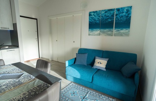 Buggerru Haus | Holiday Home 'Sole E Mare Buggerru - Appartamento' with Sea View, Private Terrace and Air Conditioning