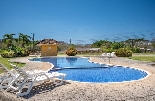 Villarreal Haus | Home in a gated community with outdoor pool, patio, grill, streaming, W/D, & AC