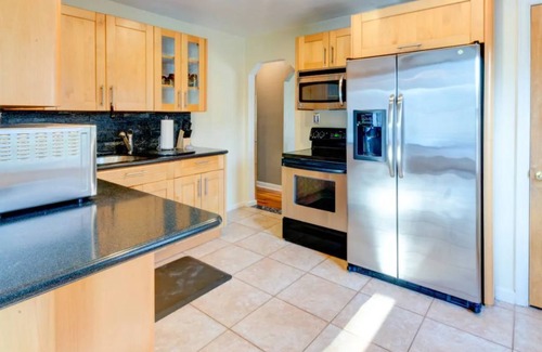 Madison Heights Haus | Home in Royal Oak w/ pool & sauna & dream garage