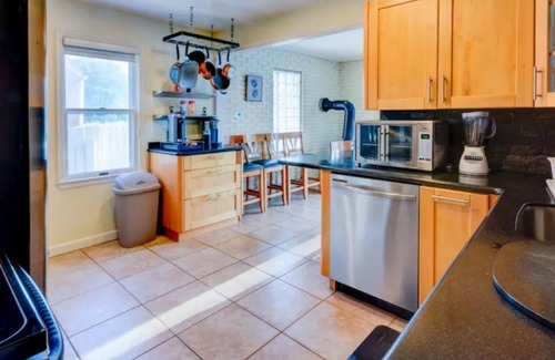 Madison Heights Haus | Home in Royal Oak w/ pool & sauna & dream garage