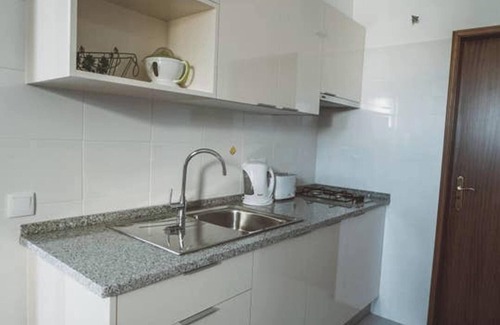 Vale de Seixos Wohnung | Homerez - Modern apartment in Estói with shared pool.